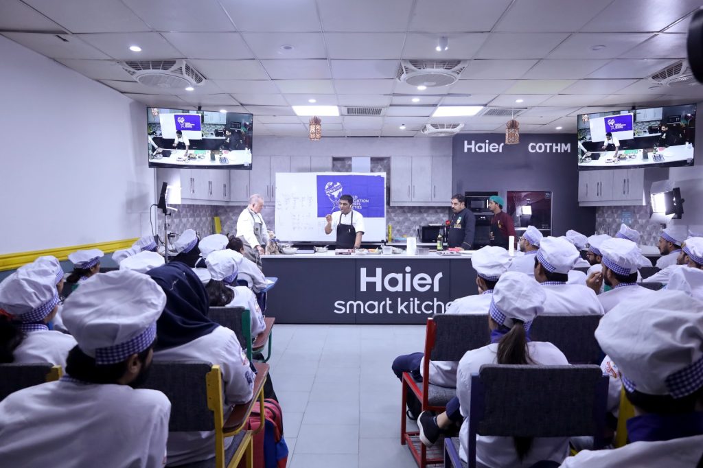 Executive Chef Mohammad Raees with COTHM students in culinary session