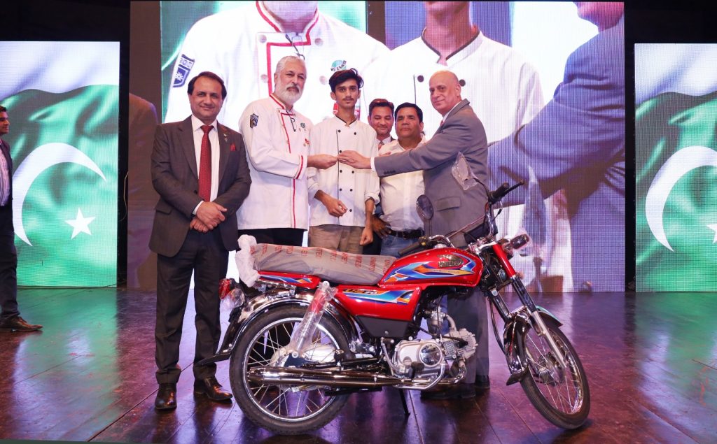 Lucky draw motorbike prize presentation