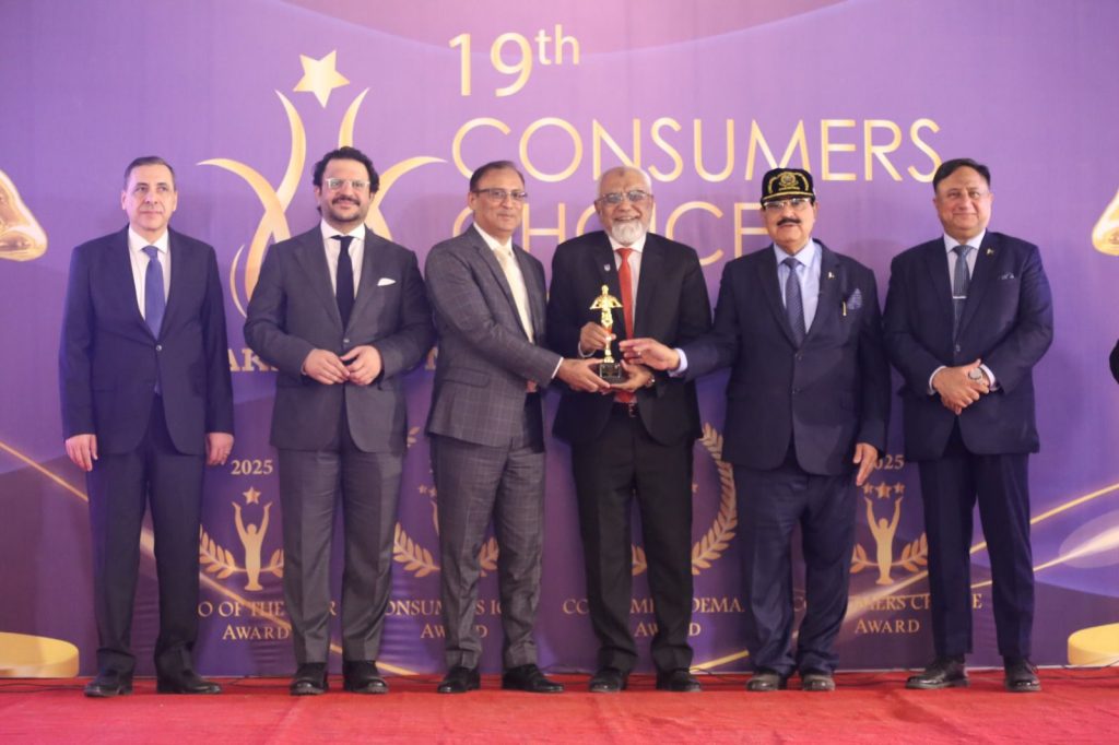 COTHM Executive Director receiving Best Hospitality Institute award.