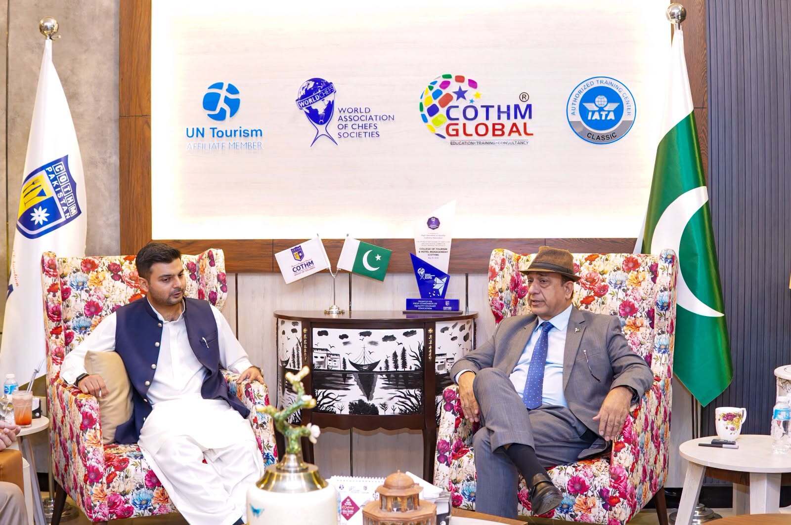 Malik Taimur Ahmed Khan interacting with COTHM students